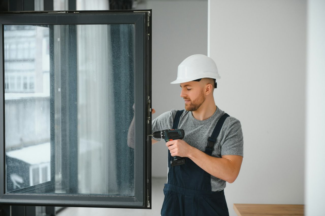 professional-master-at-repair-and-installation-of-windows-at-work-.jpg